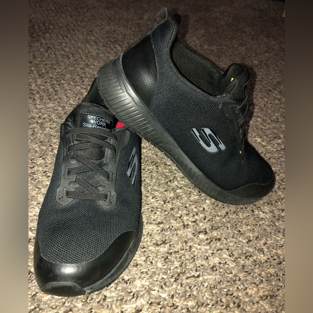 Skechers women’s Black 
Work shoes , slip resistant, memory foam.